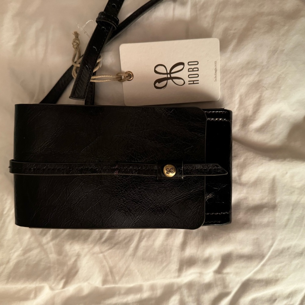 Hobo black leather cross body bag.